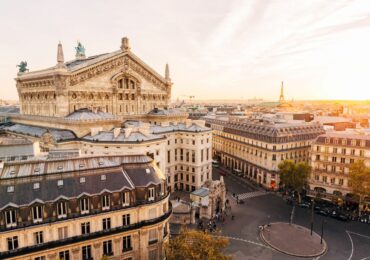 high-angle-view-of-paris-skyline-at-sunset-royalty-free-image-1575587641